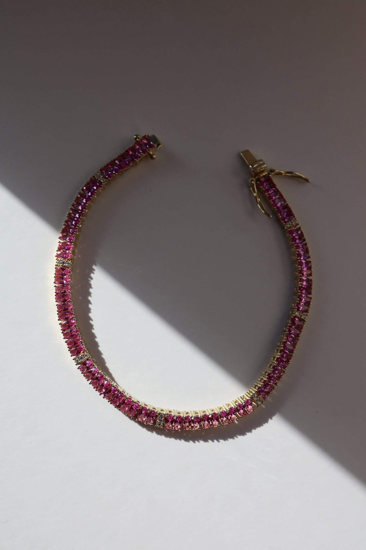 Pink Sapphire Oval Tennis Bracelet