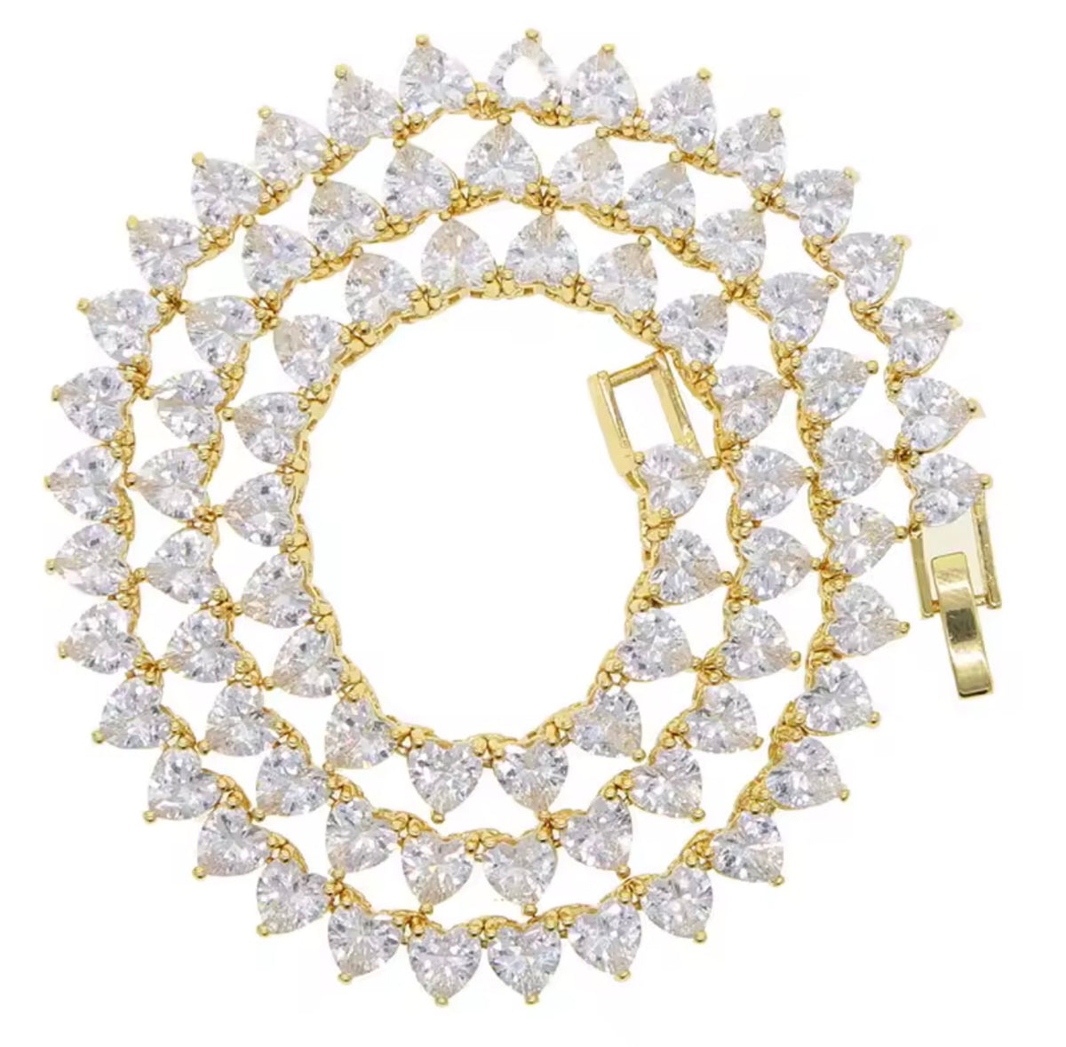 Gold heart-cut cubic zirconia tennis necklace with box clasp on white background
